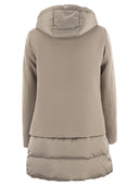 Herno una giacca a forma di cappa