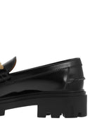 Il moccasina di Tod con catena