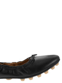 Ballerina di Tod con arco e granmetti